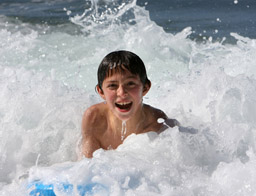 Kid in waves